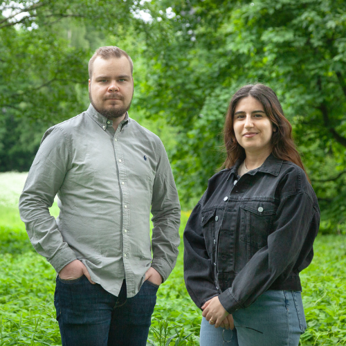 Picture of Emilie Hachem and Tommi Pesonen in a green landscape 