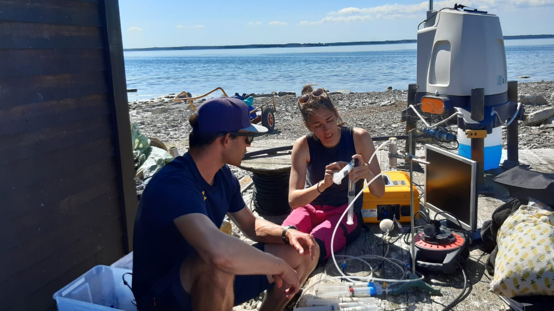 Two researchers working on instruments