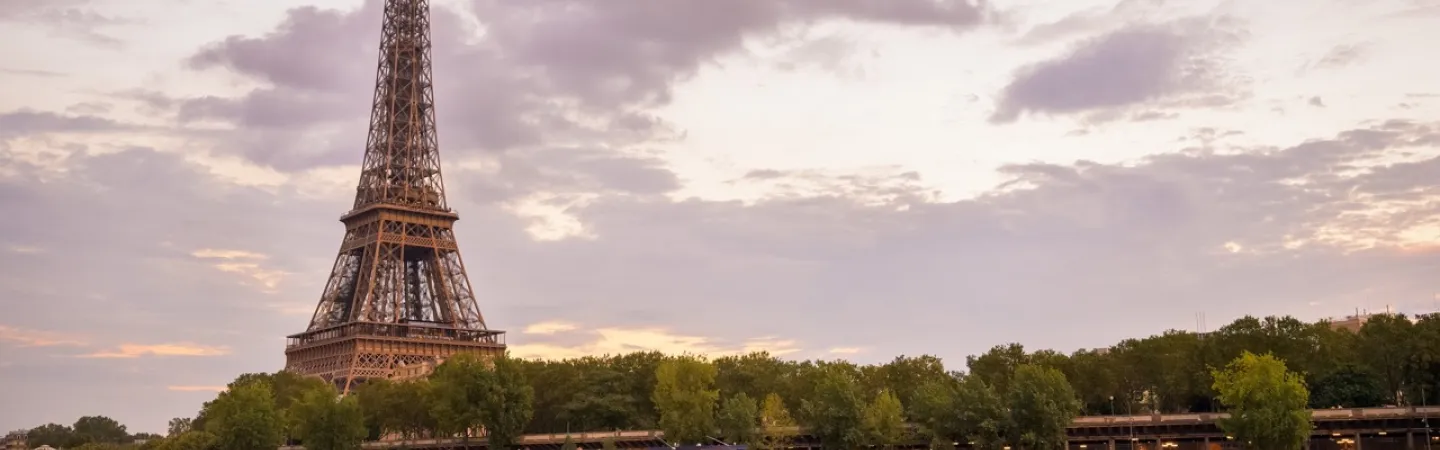 cruise boat on the river seine with the eiffel tower on the background