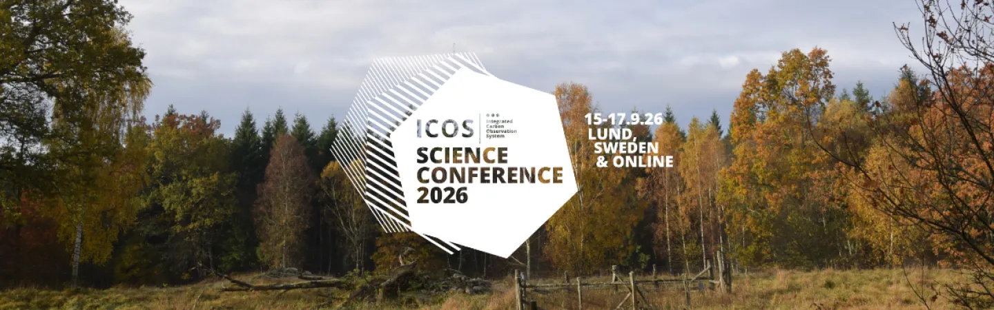A scenic autumn landscape with golden and orange trees behind a grassy field and a low stone fence. Centered on top of the image is a white geometric hexagon containing text that reads: “ICOS – Integrated Carbon Observation System. Science Conference 2026. 15–17 September 2026. Lund, Sweden & Online.”