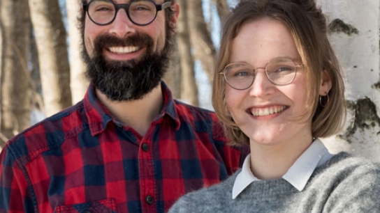 Image of ICOS new people Laurent and Maria smiling in front of a tree