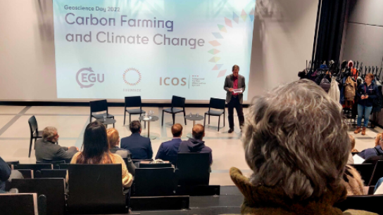 audience listening to Geoscience Day presentation 